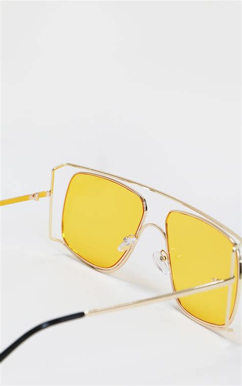 clear frame yellow lens sunglasses.